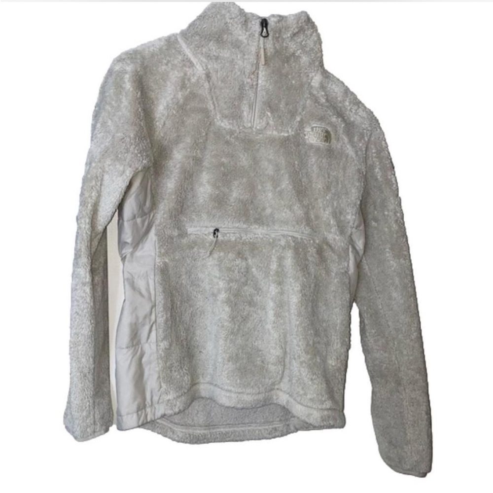 tan sherpa north face quarterzip wind breaker. warm and has a pocket in front